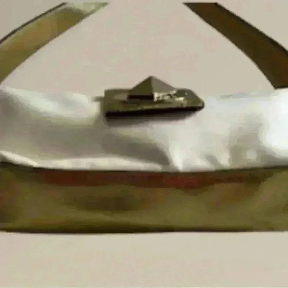 Kate Spade canvas and leather baguette bag